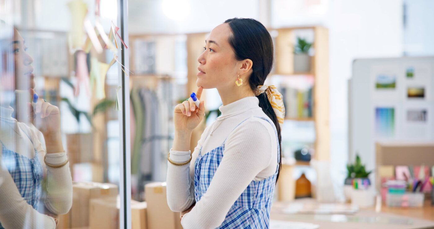 Thinking,,Brainstorming,Board,And,Asian,Woman,,Designer,And,Retail,Expert Thinking,,Brainstorming,Board,And,Asian,Woman,,Designer,And,Retail,Expert